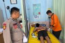 Caption: Korban Saat Berada di Puskesmas Tambelangan (Sumber Foto: Humas Polres Sampang/Pilar Pos)