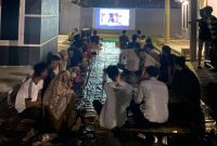 Kegiatan nonton bareng (nobar) video dokumenter *Pesta Babi* pada Selasa malam (malam Rabu) pukul 19.00. Wib. 