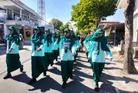 Caption: Peserta Nomor Undi 085 Kelas VII SMPN 1 Sampang yang meraih gelar juara III regu putri (Sumber Foto: Agus Junaidi/Pilar Pos)