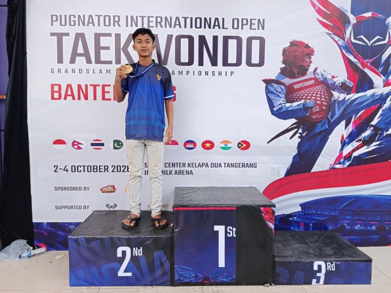 Caption: Dhafa Agam Kholilullah saat berada di stadium penerimaan penghargaan juara (Sumber Foto: Imawan Wasik For Pilar Pos)