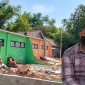 Caption: Achmad Rifai, Ketua LSM Lasbandra, dan lokasi proyek di SDN Komis 1 Kedungdung Sampang (Sumber Foto: Agus Junaidi/Pilar Pos)